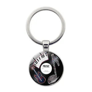 Music vinyl record glass dome metal keychain detail, stylish music pendant charm accessory gift.