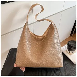 Brown woven leather shoulder bag, stylish casual tote with comfortable strap detail.