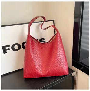 Red woven leather hobo shoulder bag, stylish minimalist large capacity tote detail view.