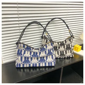 Canvas shoulder bag for women with cute rabbit pattern, stylish daily casual tote bag in two colors.