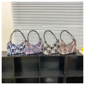 Canvas shoulder bag with cute rabbit pattern and geometric design, casual style for daily use.