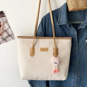 Large capacity contrast color tote bag for women, stylish debossed PU leather shoulder bag.