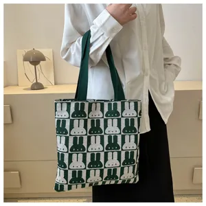 Knitted green rabbit pattern tote bag, stylish casual shoulder bag for women daily use.