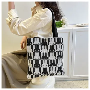 Black and white knit tote bag for women, cute rabbit pattern casual shoulder bag, stylish chic.