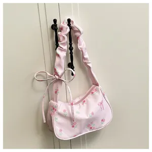 Sweet pink floral shoulder bag with cute bow and scrunchie strap for daily fashion style.