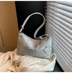 Chic silver metallic snake print shoulder underarm bag stylish handbag for women daily commuting.