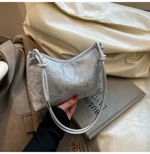 Chic silver snake pattern underarm shoulder bag for women, trendy commuting handbag.