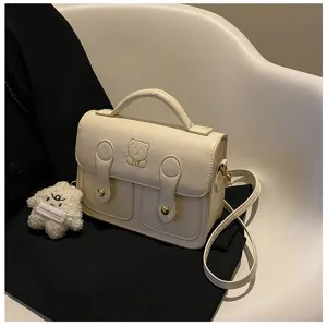 Retro mini PU leather satchel bag for women, cute bear embossed crossbody messenger bag.
