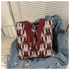 Knitted tote bag with cute red and white bunny checkerboard pattern for daily casual wear.