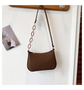 Borsa a spalla in feltro marrone con motivo coccodrillo e tracolla a catena chic.