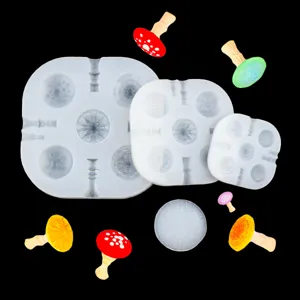 Detailed view of miniature 3D mushroom silicone molds and finished clay crafting pieces.