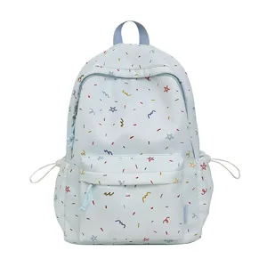 Cute Japanese style pastel blue backpack with colorful stars and graffiti pattern for students.