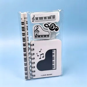 Piano note stationery set including notebook, pencils, and erasers for students learning music gifts.