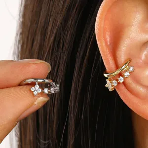 Detail view showing a luxury hollow zircon ear cuff in both gold and silver finish