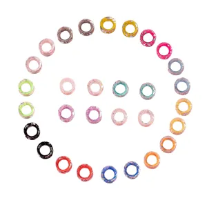 Colorful silicone ear gauges plugs detail view, various painted body piercing jewelry styles.