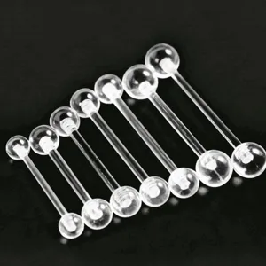 Clear acrylic tongue ring barbell body piercing jewelry detail shot, transparent flexible stem.