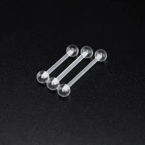 Clear acrylic barbell body piercing studs detail shot, flexible transparent retainer for tongue ear