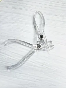 Clear acrylic body piercing tool detail, transparent opening closing plier for ear body art.