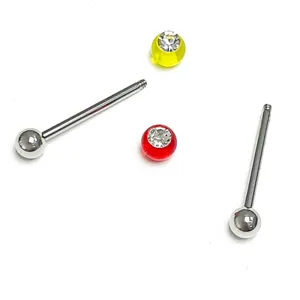 Body piercing jewelry detail showing stainless steel straight bars and colorful acrylic crystal balls.