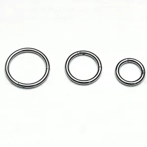 Stainless steel nose rings and cartilage earrings set, simple circular design for body piercing.