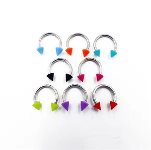 Stainless steel horseshoe barbell piercing body jewelry with colorful acrylic spikes.