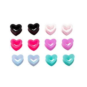 Boucles d'oreilles écarteurs en silicone en forme de cœur kit de piercing coloré et tendance