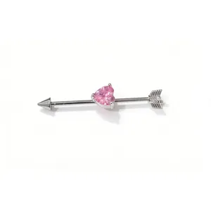Industrial barbell piercing jewelry with pink heart crystal and arrow design for body piercing.