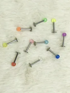 Stainless steel labret piercing stud with colorful acrylic replacement ball body jewelry.