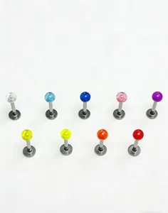 Colorful stainless steel lip piercing studs with acrylic replacement balls for body art fashion.