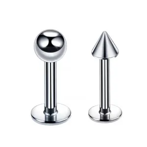 Titanium labret stud piercing jewelry with flat back, round ball and cone top styles.