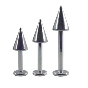 Titanium spike labret stud piercing body jewelry detail view showing three different sizes.