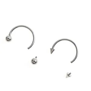 Details of G23 titanium circular barbell body piercing jewelry with balls and spikes.
