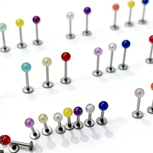 Details showing colorful stainless steel piercing lip studs and labret rings closely.