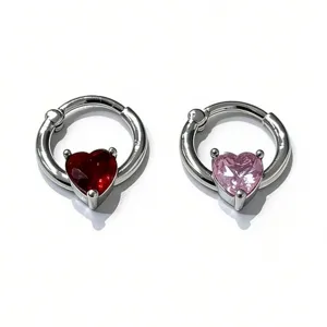 Heart septum ring clicker body piercing jewelry with red pink cubic zirconia stones.