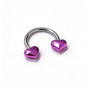 Heart septum ring detail shot showing the purple heart ends and polished steel bar.