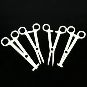 Professional white plastic body piercing clamps, closure pliers tool set for ear nose septum.