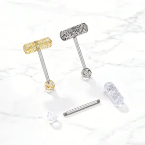 Detail view of T-shaped capsule tongue ring with glitter acrylic and stainless steel bar.