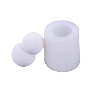 White silicone sphere cake mold with two ball shapes for DIY baking and mousse dessert making.