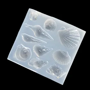Clear silicone mold for resin casting, featuring various sea shell and conch for jewelry.