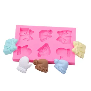 Silicone mold for Christmas gifts, hats and gloves, perfect for baking and fondant.