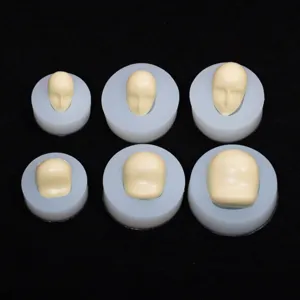Silicone face molds detail shot, showing different sizes and shapes for DIY clay and fondant.