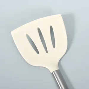Silicone slotted spatula with stainless steel handle, heat-resistant cooking kitchen tool for home.