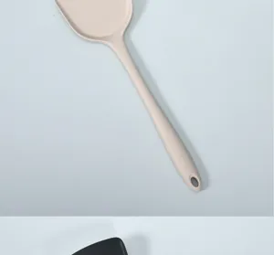 Thick silicone spatula for non-stick pan, high temperature resistant kitchen cooking tool.