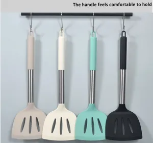 Large silicone slotted spatula with stainless steel handle, heat resistant cooking tool set.