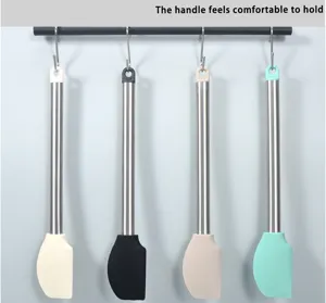 Silicone spatula detail view, stainless steel handle, hanging design, durable baking tool.