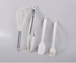 4-piece silicone baking kitchen tool set including whisk, food tongs, spatula, and brush.