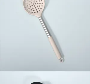 Silicone slotted spoon detail view, stainless steel handle kitchen cooking tool close-up.