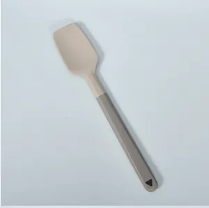 Silicone spatula baking scraper detail view, flexible kitchen tool with two-tone handle design.