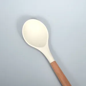 Silikon Kochlöffel mit Holzgriff, hitzebeständiges Küchenutensil für Antihaftpfannen.
