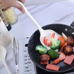 White silicone spatula for non-stick pan, heat resistant kitchen cooking utensil, solid turner.